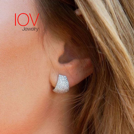 huggie wide earrings.