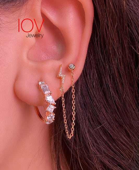 bolt shape and single stone double stud chain earring.