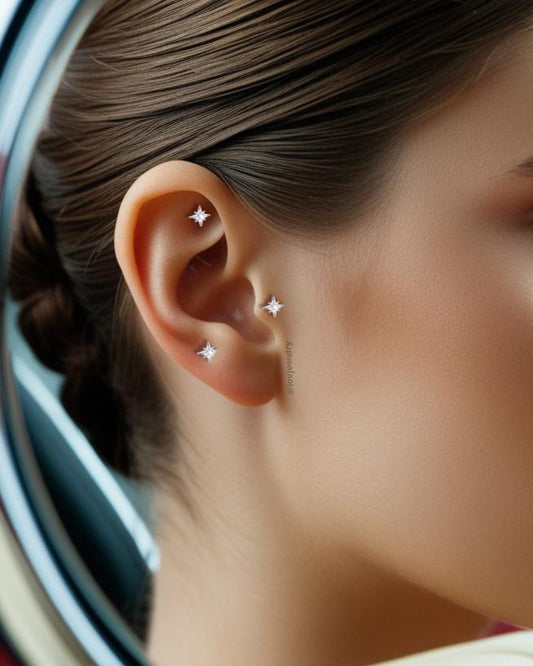 Star shape with single CZ stone piercing flatback.