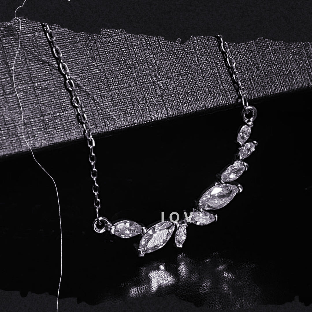 marquise stones curved bar necklace.