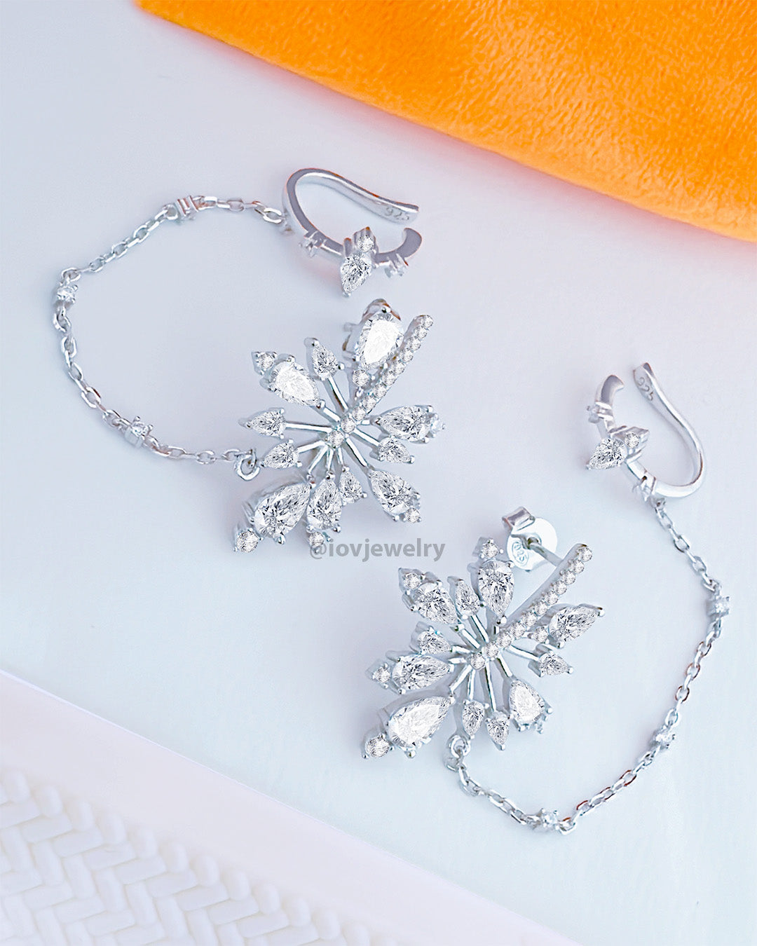 cluster of pear shapes attached to earcuff.