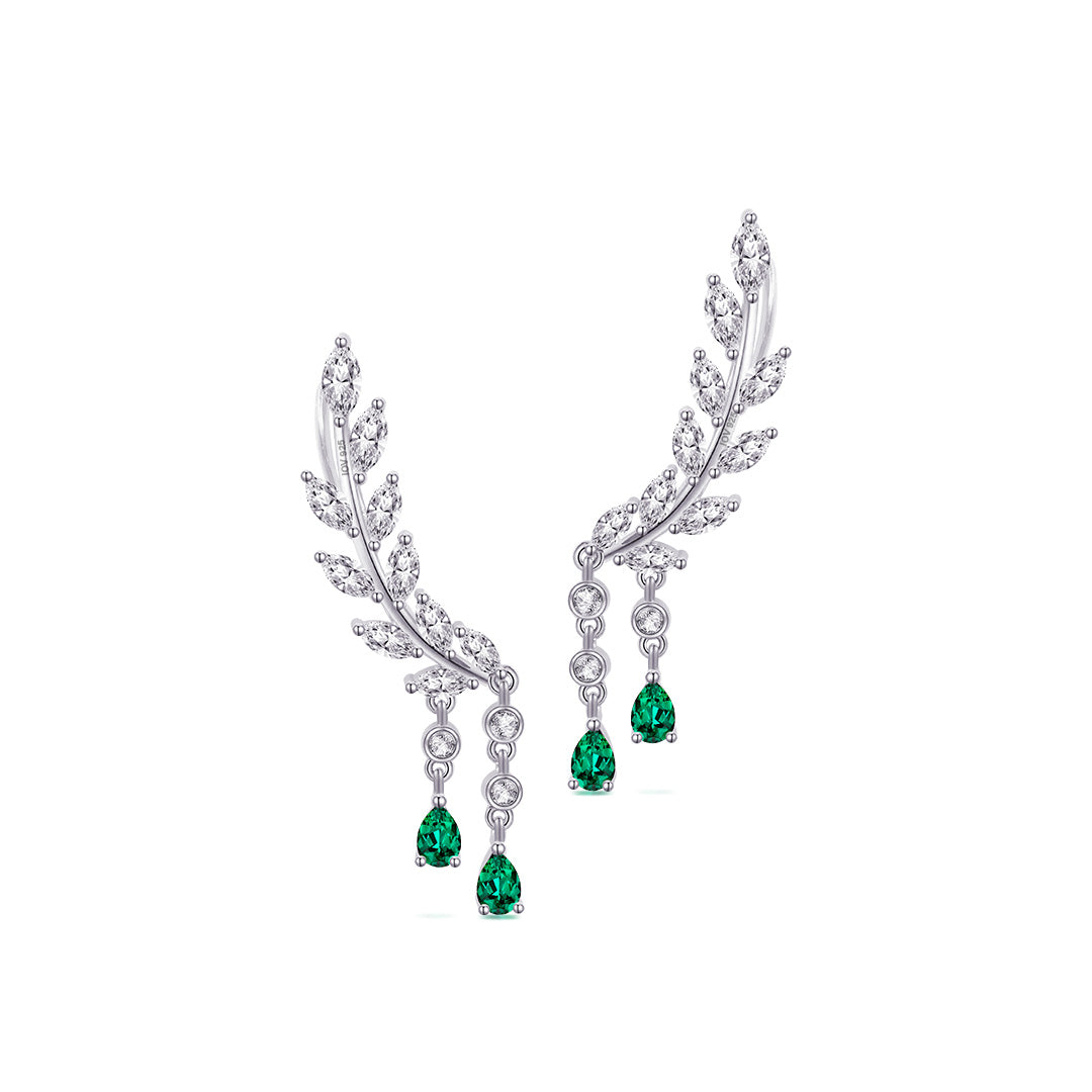 feather shape climber earring with dangling emerald color pear shape stones.