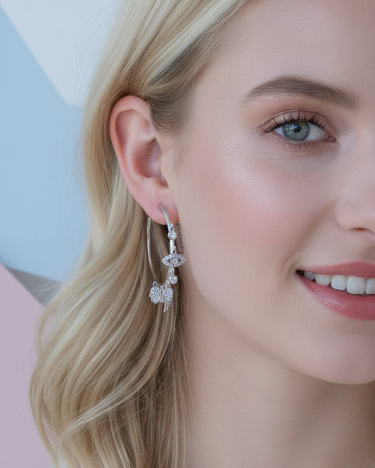 wide plain hoop with dangling CZ charms.