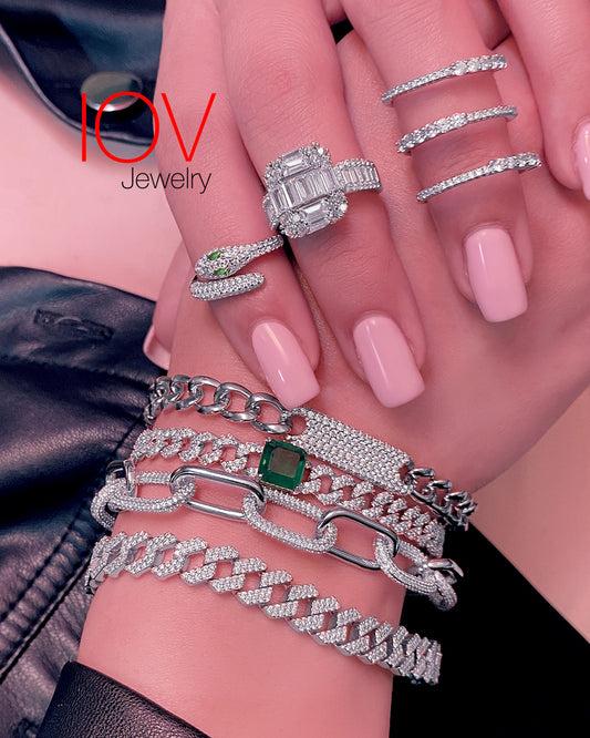 curb chain diamond style bracelet with square emerald stone.