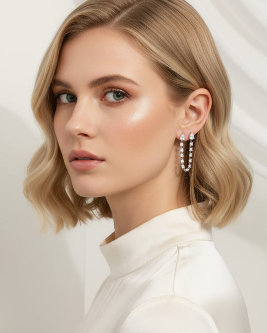 double stud Pear and round connected CZ earring.