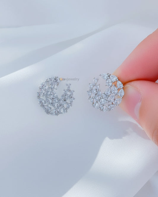 circle of graduated CZ pear shapes stud earring.