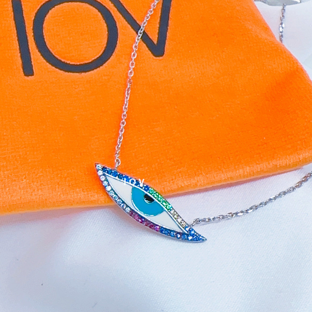 white and blue enamel eye shape necklace.