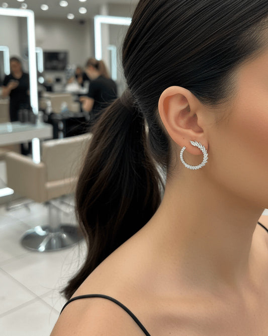 incomplete circle of marquise and round CZ stud earring.