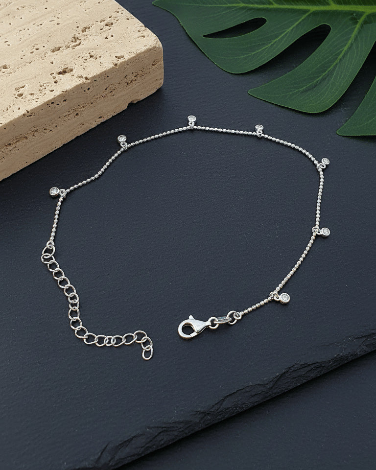 faceted beads anklet with dangling round CZ in bezel setting.