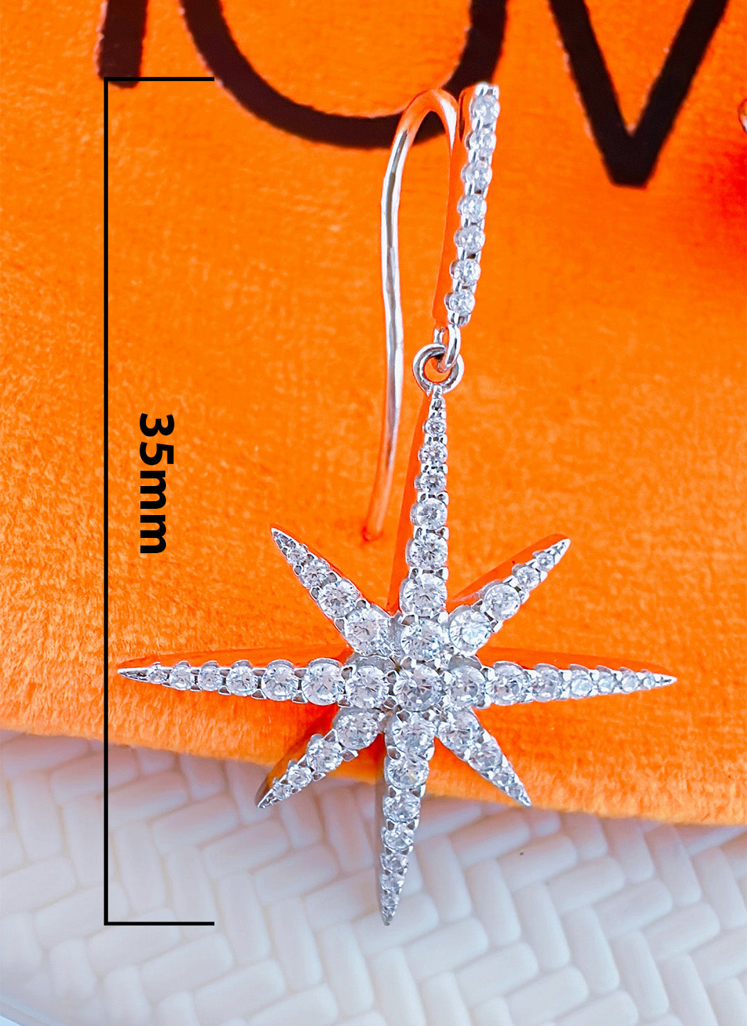 hook style CZ star earring.