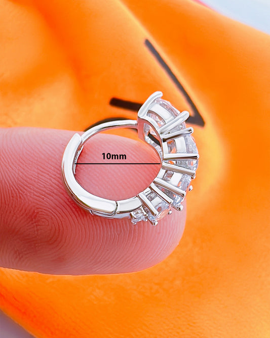 huggie hoop earring with graduated round CZ stones.