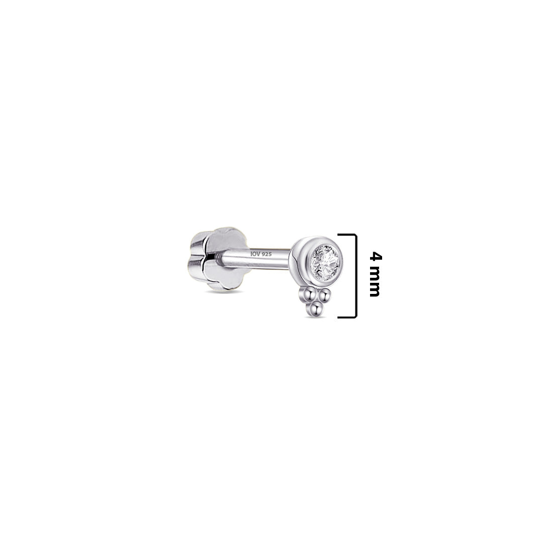 CZ white stone in a bezel setting with three small balls.