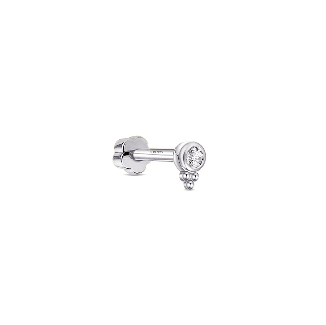 CZ white stone in a bezel setting with three small balls.