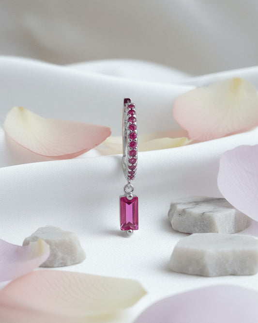 9 mm fuchsia color stones huggie hoop with dangling baguette shape.