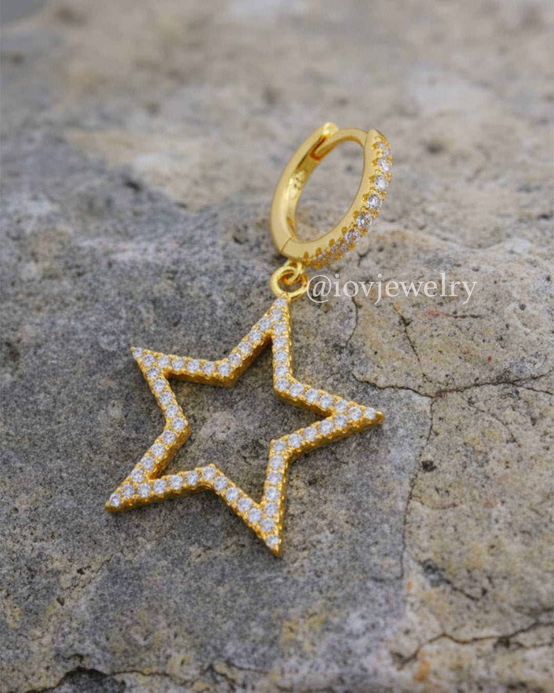 CZ huggie hoop with dangling star shape earring.