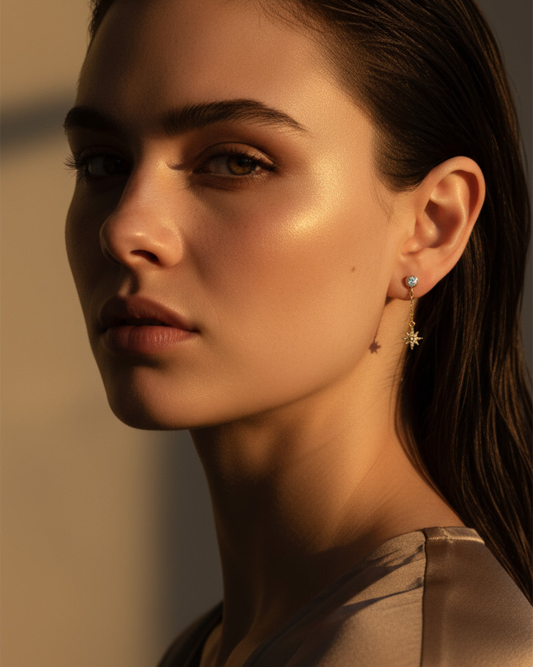 CZ round stone in bezel setting with delicate dangling star shape stud earring.