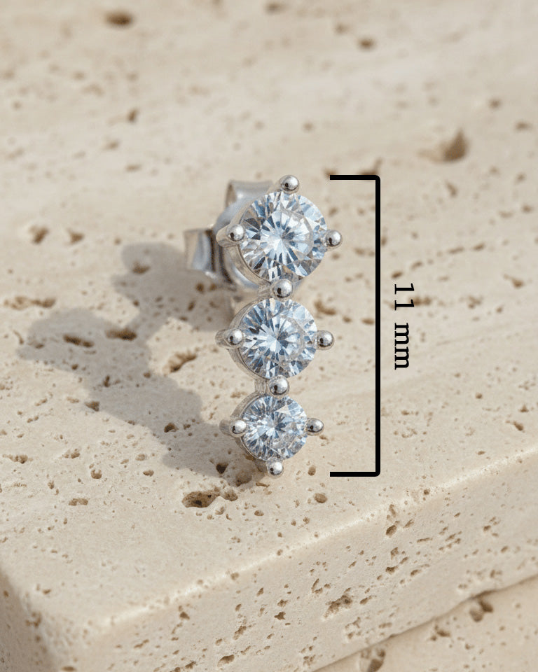 Three graduated round CZ stones stud earring.