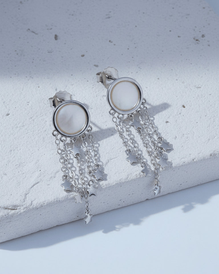 mother of pearl with dangling chains earrings.