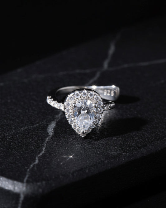Pear shape CZ in halo setting earcuff.