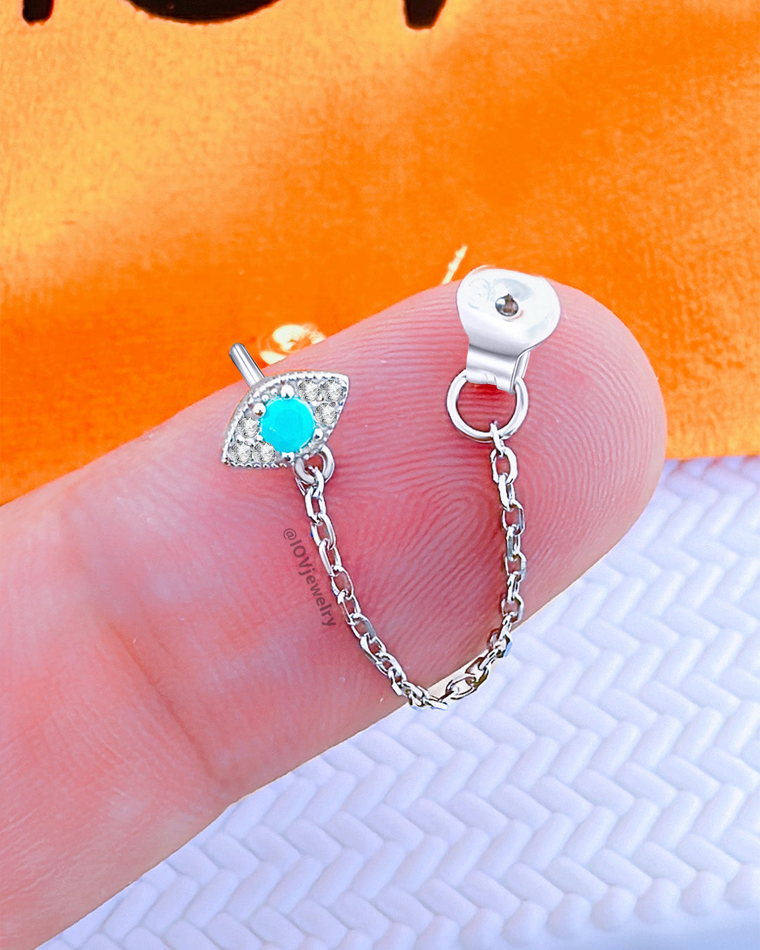 turquoise and CZ back and front chain earring.