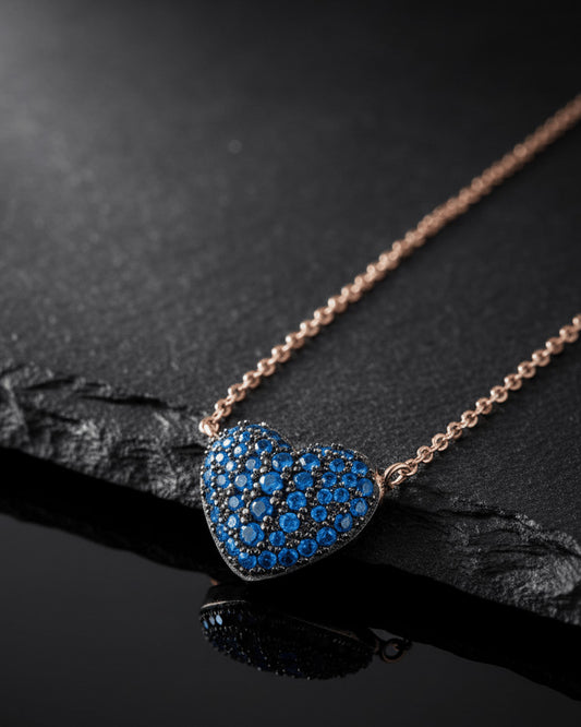 Rosegold sapphire color CZ heart shape necklace.
