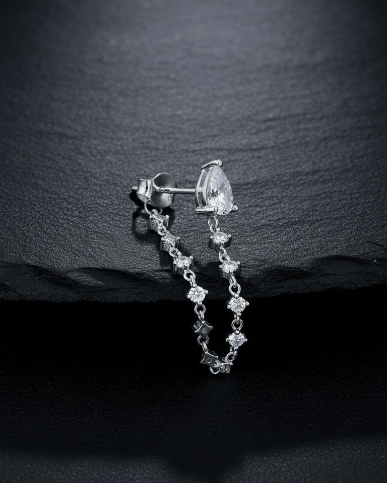 back to front pear shape stud with dangling CZ chain earring.