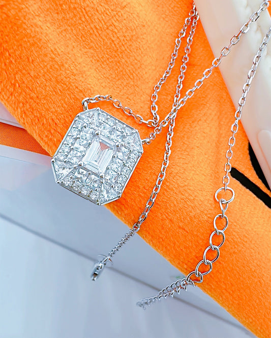 rectangular shape necklace with emerald cut CZ stone in center.
