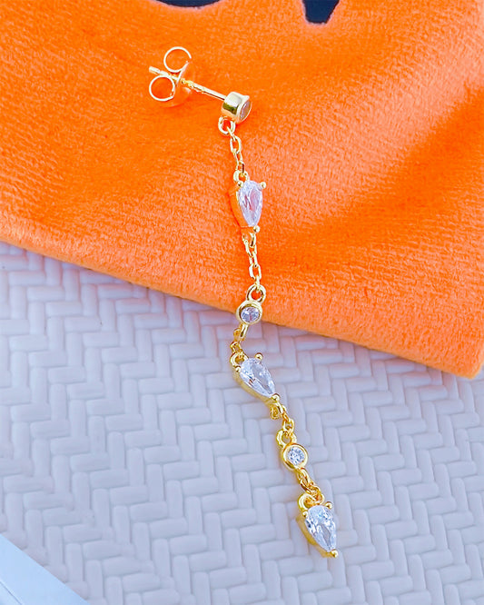 CZ long earring with round and pear shape stones.