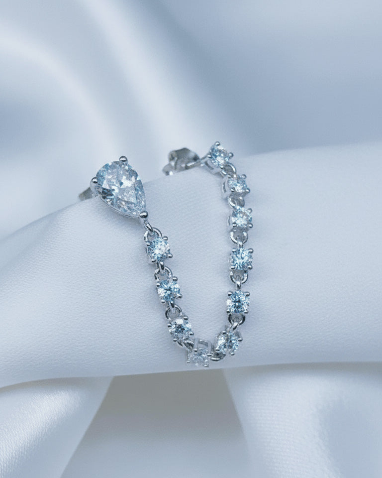 CZ pear and round stones double stud earring.