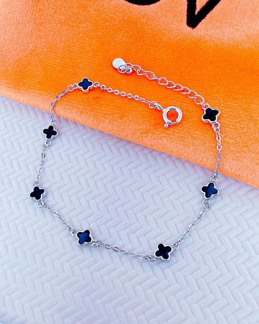 black and white four clover shape bracelet.