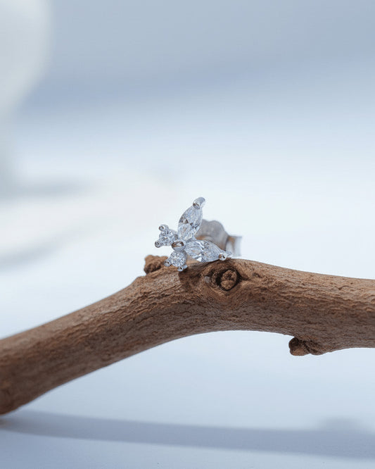 tiny butterfly shape stud earring.