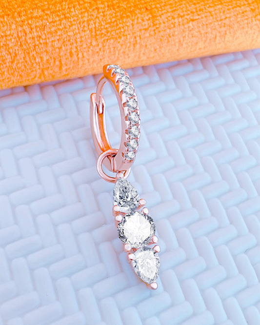 CZ huggie hoop earring with removable line of pear and round shape stones.