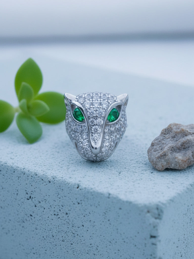 CZ tiger shape with emerald color eyes stud earring.