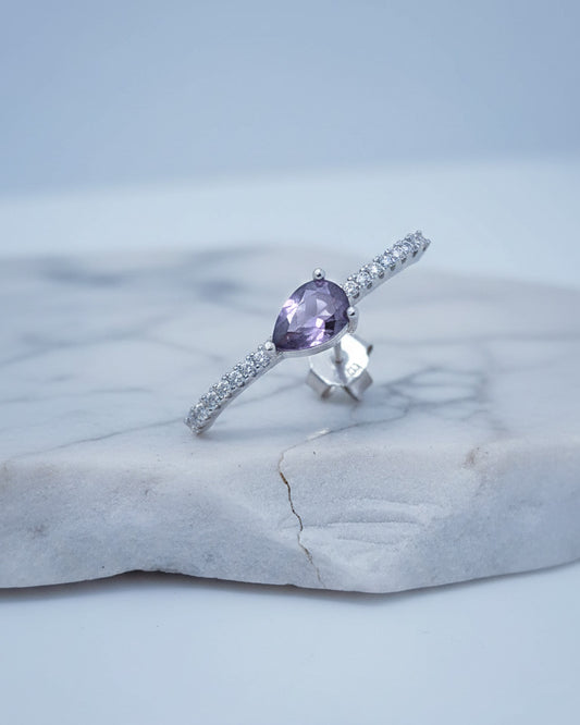 curved CZ line with pear colored stone stud earring.