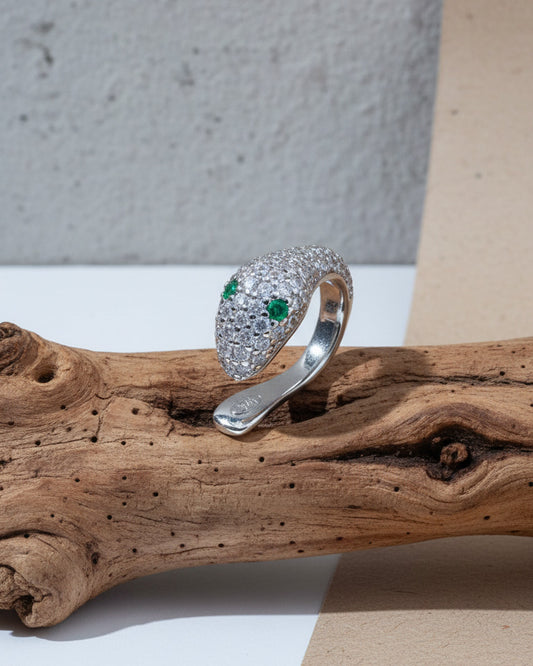 snake earcuff with emerald eyes.