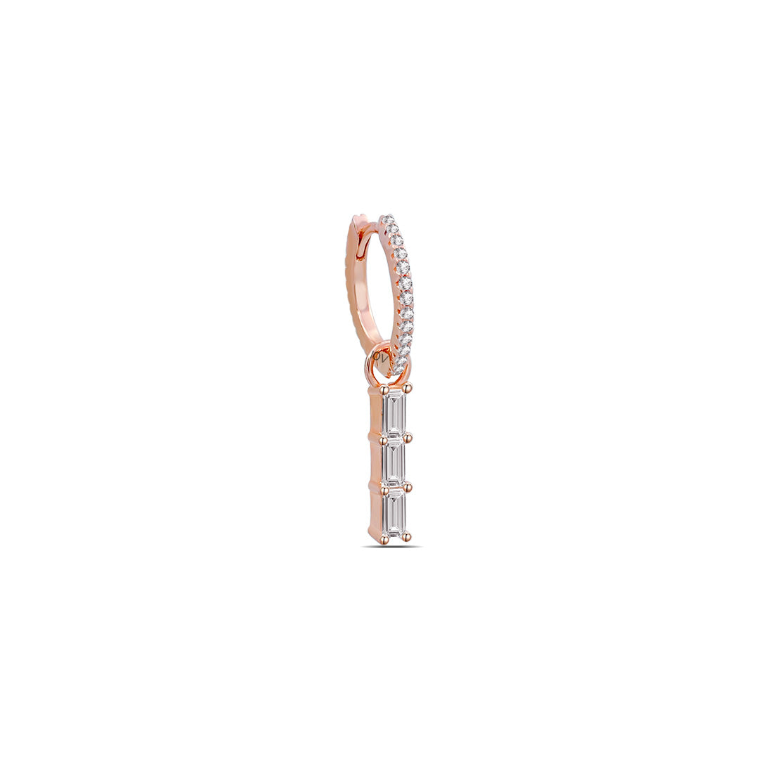 rosegold hoops with dangling baguette stones line.