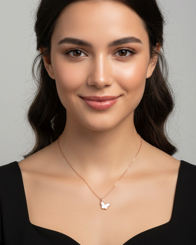mother of pearl and agate butterfly rosegold necklace.