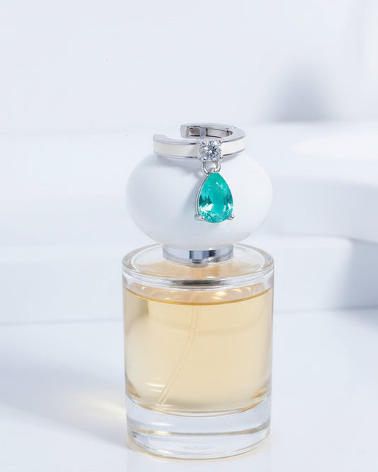 white enamel ear-cuff with dangling green pear shape CZ stone.