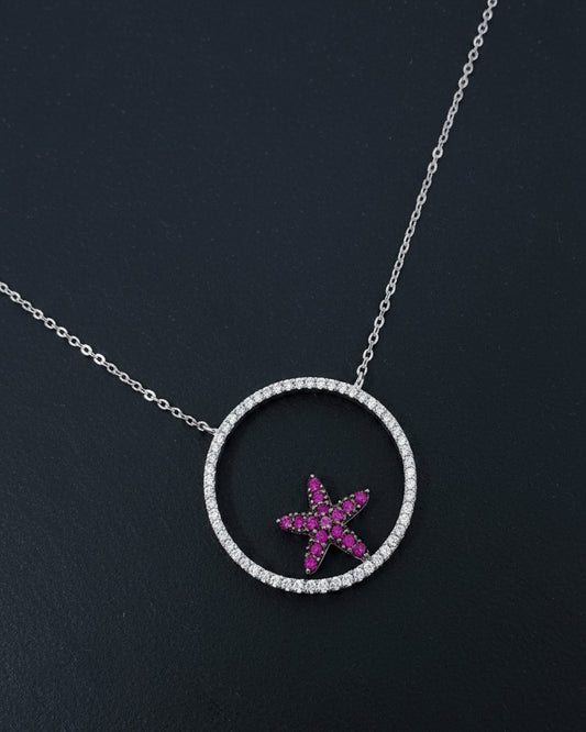 Circle necklace with a ruby color star necklace.