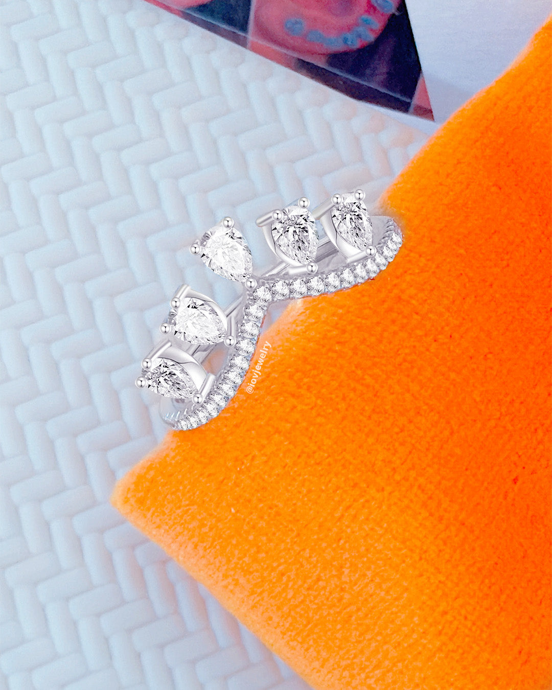 pear shapes CZ in a tiara shape ring.