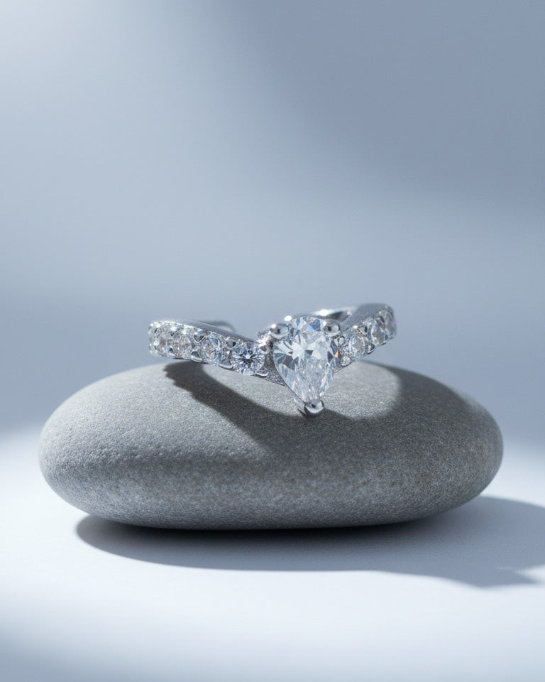 simple CZ ear-cuff with a center pear shape stone.