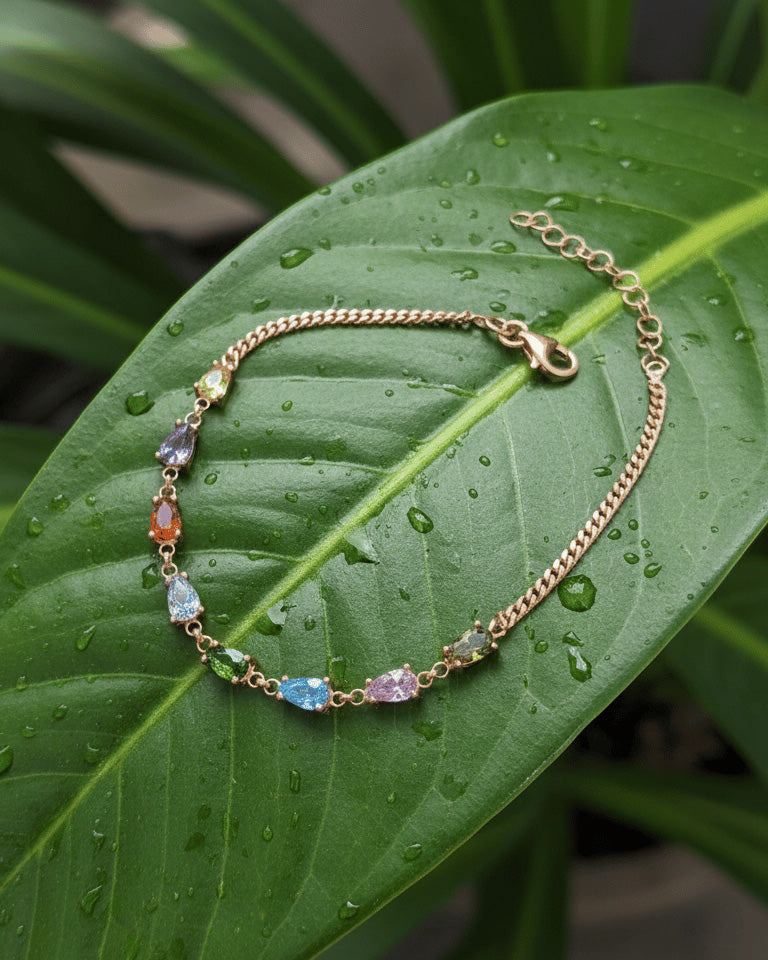 colored CZ pear shapes curb chain rosegold bracelet.