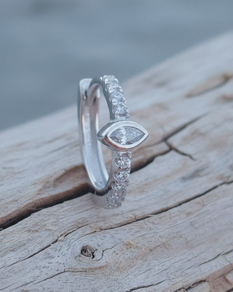 9mm CZ huggie hoop with a horizontal marquise stone.