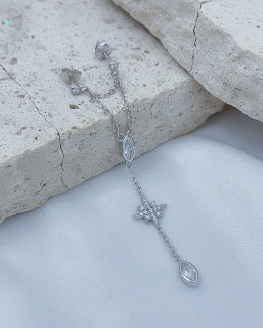 double stud dangling earring with star shape and marquise stones in bezel setting.