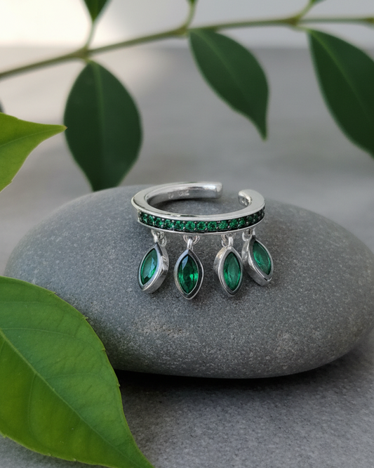 emerald color CZ with dangling marquise shapes.