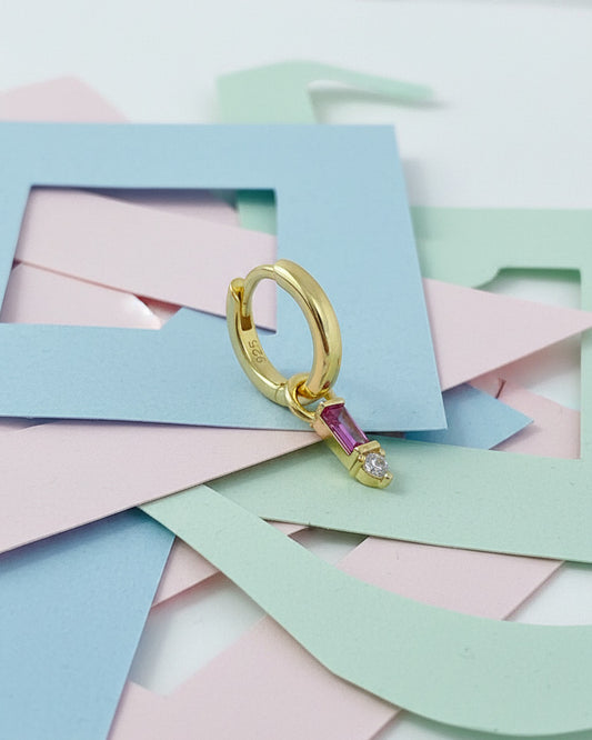 9 mm plain huggie hoops with removable dangling with pink baguette stone.