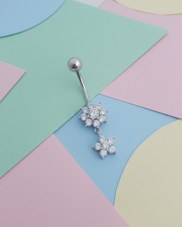 two flower shapes belly piercing.