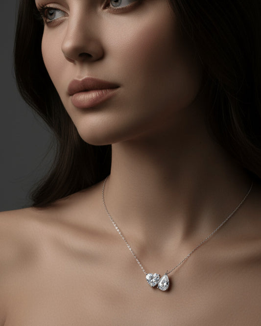 toi et moi heart and pear shape necklace.