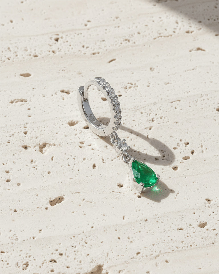 8mm huggie hoop with dangling opaque green pear shape stone.