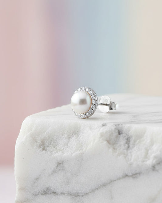 pearl stud earring with halo setting.